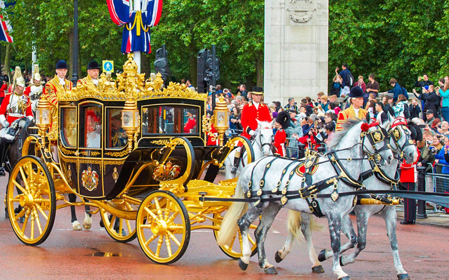 A royal carriage outside Buckingham Palace